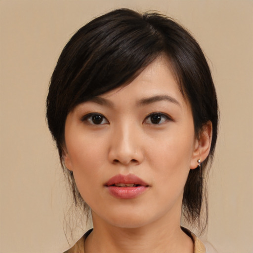 Neutral asian young-adult female with medium  brown hair and brown eyes