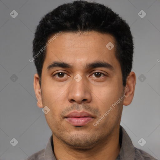 Neutral latino young-adult male with short  black hair and brown eyes