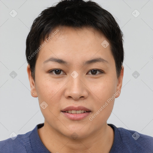 Joyful asian young-adult female with short  brown hair and brown eyes