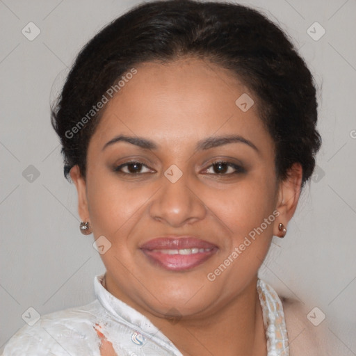 Joyful latino adult female with short  brown hair and brown eyes