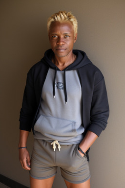 Zambian 45 years male with  blonde hair