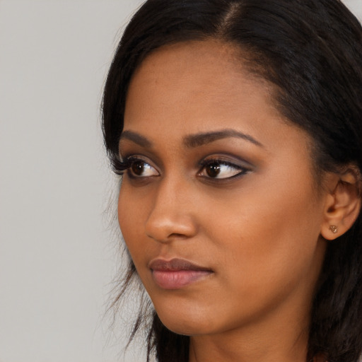 Neutral asian young-adult female with long  black hair and brown eyes