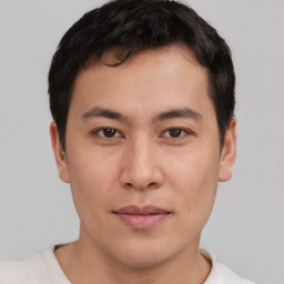 Neutral asian young-adult male with short  brown hair and brown eyes