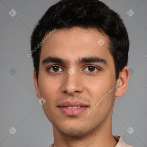 Joyful white young-adult male with short  black hair and brown eyes