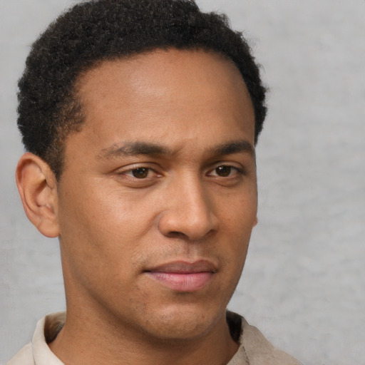 Neutral latino young-adult male with short  brown hair and brown eyes