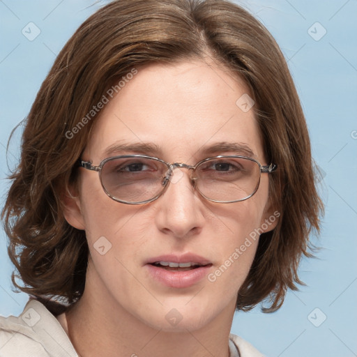 Joyful white adult female with medium  brown hair and blue eyes