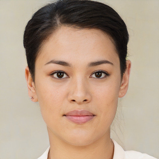 Joyful asian young-adult female with short  brown hair and brown eyes