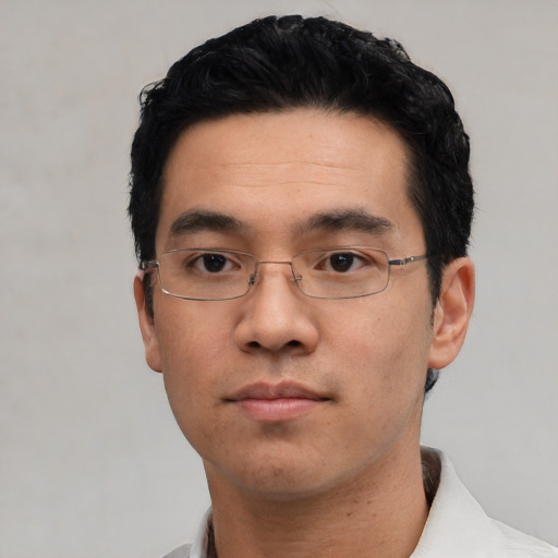 Neutral asian young-adult male with short  black hair and brown eyes