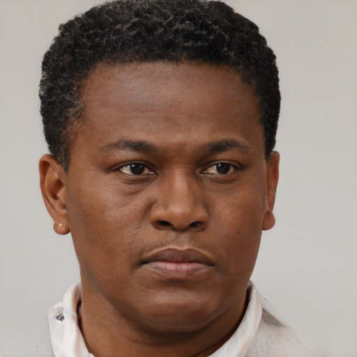 Neutral black young-adult male with short  brown hair and brown eyes