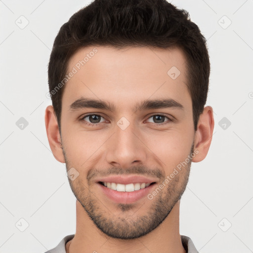 Joyful white young-adult male with short  brown hair and brown eyes