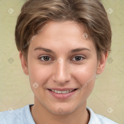 Joyful white young-adult female with short  brown hair and brown eyes