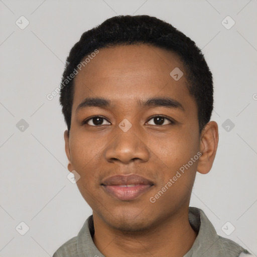 Joyful black young-adult male with short  black hair and brown eyes