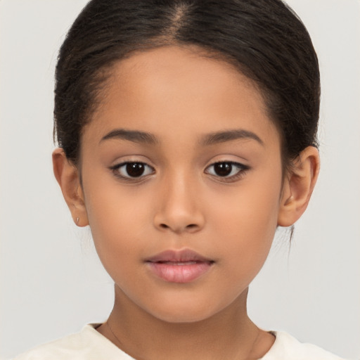 Neutral latino child female with short  brown hair and brown eyes