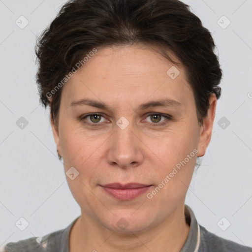 Joyful white adult female with short  brown hair and brown eyes