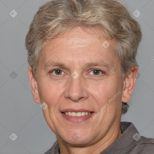 Joyful white middle-aged male with short  brown hair and brown eyes