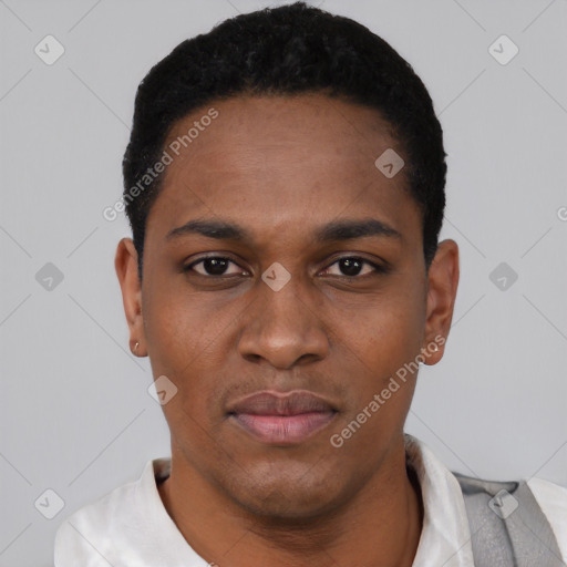 Joyful black young-adult male with short  black hair and brown eyes