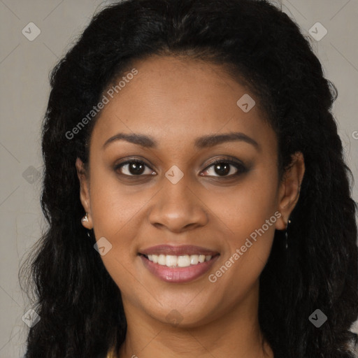 Joyful black young-adult female with long  brown hair and brown eyes