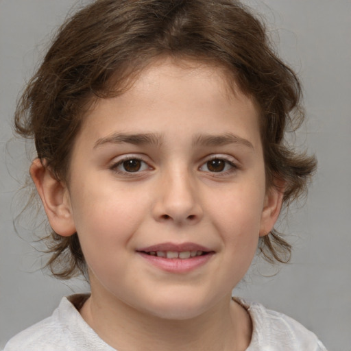 Joyful white child female with medium  brown hair and brown eyes