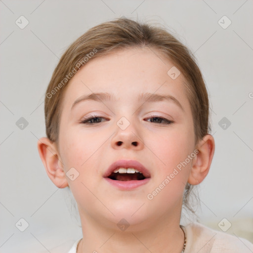 Joyful white child female with short  brown hair and brown eyes