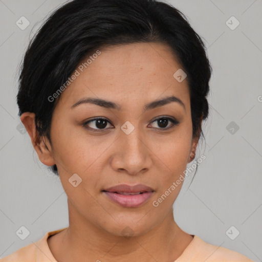 Joyful latino young-adult female with short  brown hair and brown eyes