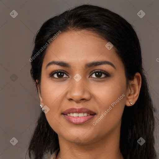 Joyful latino young-adult female with long  black hair and brown eyes