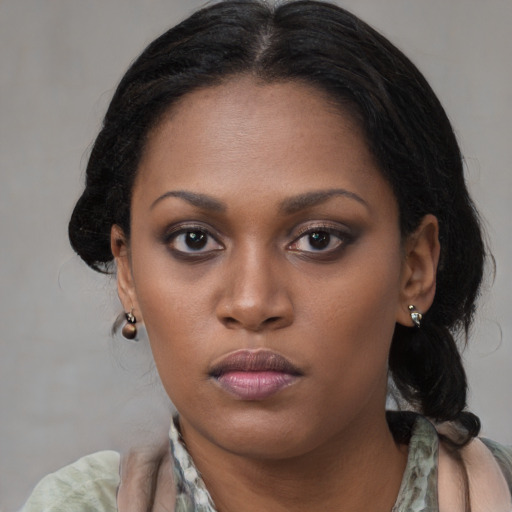 Neutral black young-adult female with medium  black hair and brown eyes