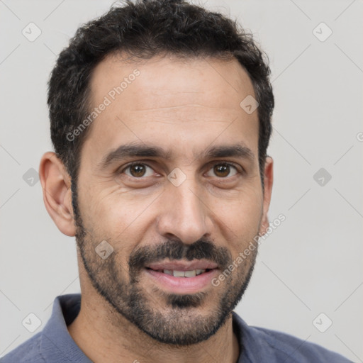 Joyful white young-adult male with short  black hair and brown eyes