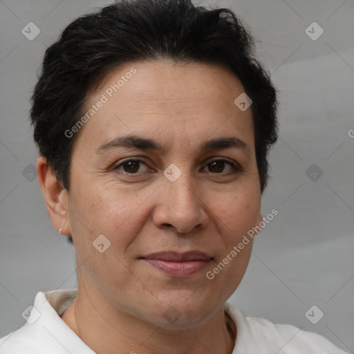 Joyful white adult female with short  brown hair and brown eyes