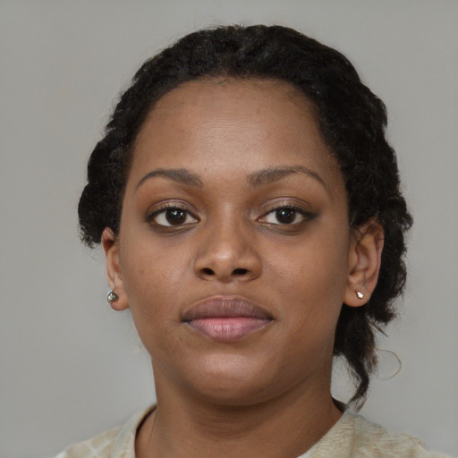 Neutral black young-adult female with short  brown hair and brown eyes