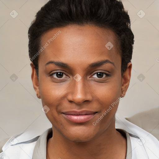 Joyful black young-adult female with short  brown hair and brown eyes