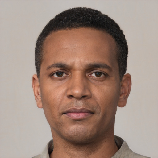 Neutral black adult male with short  black hair and brown eyes