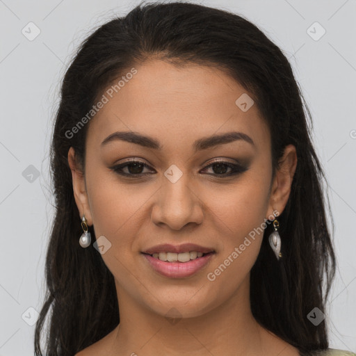 Joyful latino young-adult female with long  brown hair and brown eyes