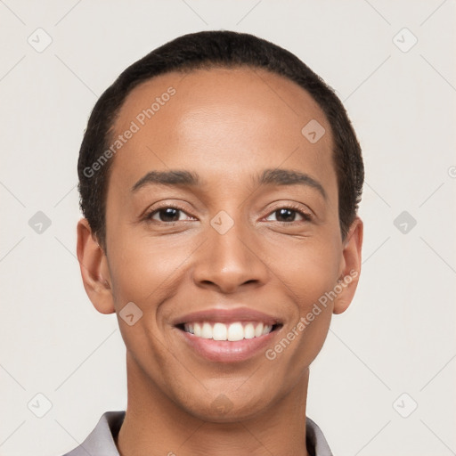 Joyful latino young-adult male with short  brown hair and brown eyes