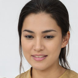 Joyful asian young-adult female with medium  brown hair and brown eyes