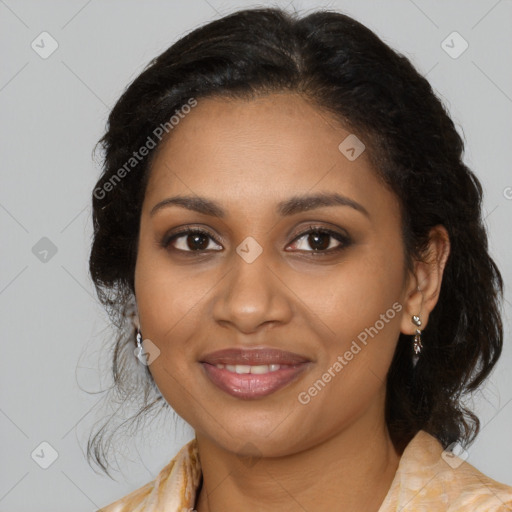 Joyful black young-adult female with medium  brown hair and brown eyes