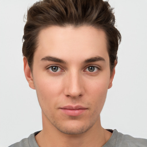 Neutral white young-adult male with short  brown hair and brown eyes