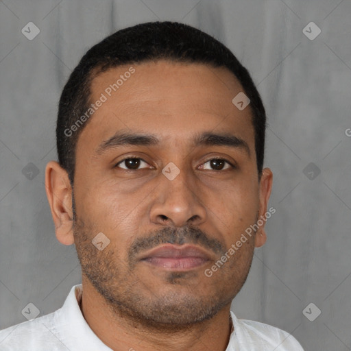Neutral latino young-adult male with short  brown hair and brown eyes
