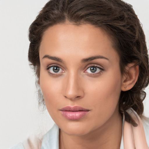 Neutral white young-adult female with medium  brown hair and brown eyes