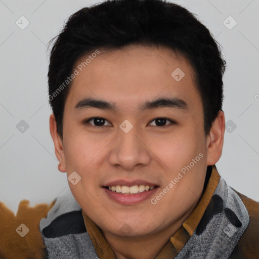 Joyful asian young-adult male with short  black hair and brown eyes