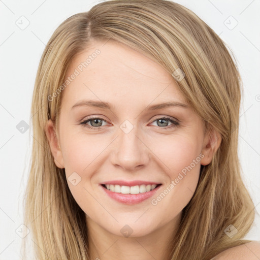 Joyful white young-adult female with long  brown hair and green eyes