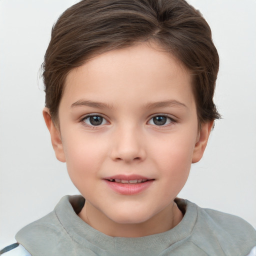 Joyful white child female with short  brown hair and brown eyes