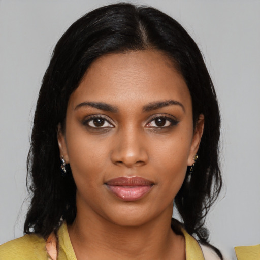 Neutral black young-adult female with medium  black hair and brown eyes
