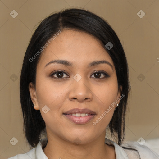 Joyful asian young-adult female with medium  black hair and brown eyes