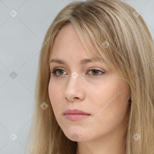 Neutral white young-adult female with long  brown hair and brown eyes