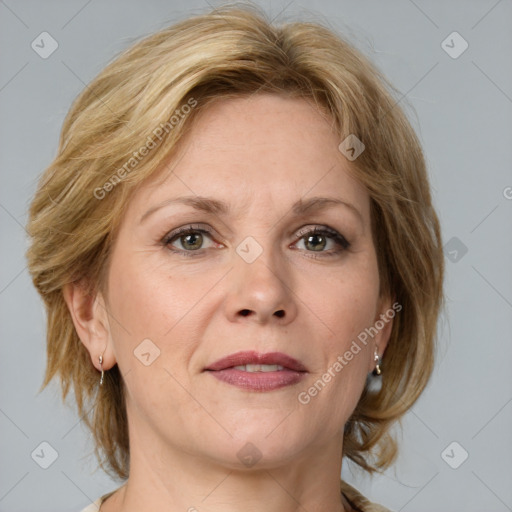 Joyful white adult female with medium  brown hair and brown eyes