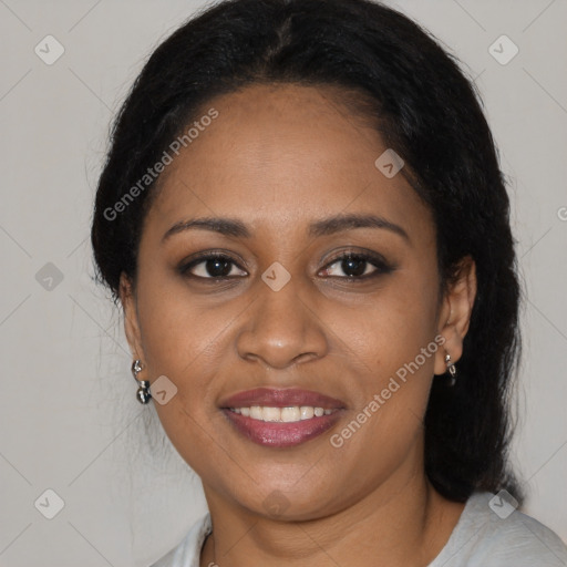 Joyful black young-adult female with medium  brown hair and brown eyes