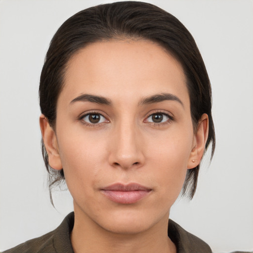 Neutral white young-adult female with medium  brown hair and brown eyes