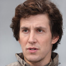 Neutral white adult male with short  brown hair and brown eyes