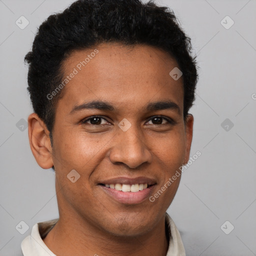 Joyful latino young-adult male with short  brown hair and brown eyes