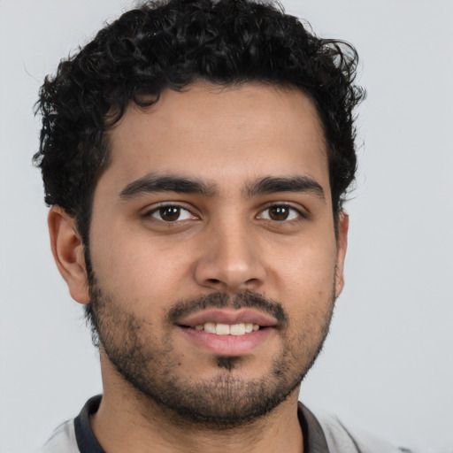 Neutral latino young-adult male with short  brown hair and brown eyes